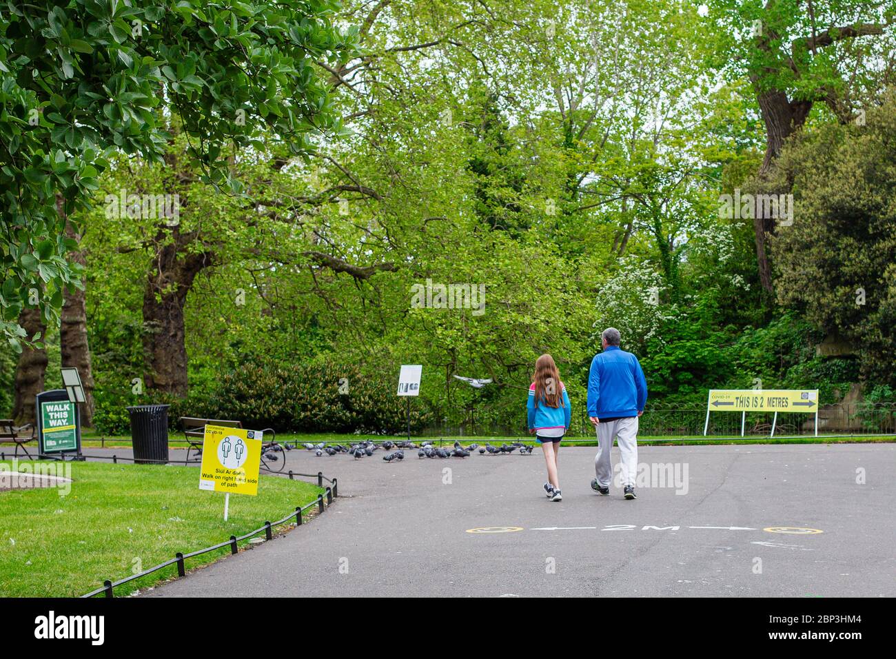 Social distancing measures in St. Stephen`s Green Park in Dublin. Reduced footfall in Dublin City Centre due to Covid-19 pandemic restrictions. Stock Photo